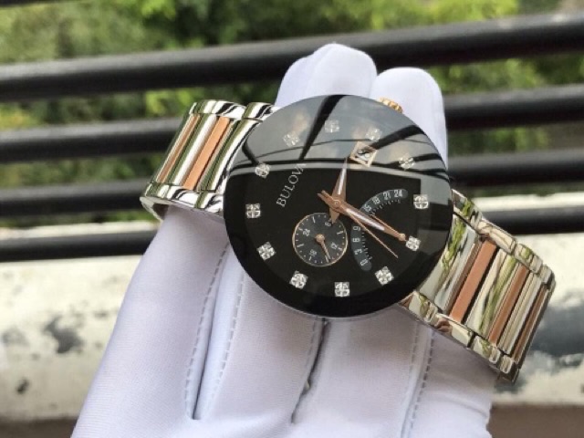 Đồng hồ nam Bulova 98D129 43mm đính kim cương, dây demi trắng - vàng hồng, lịch ngày