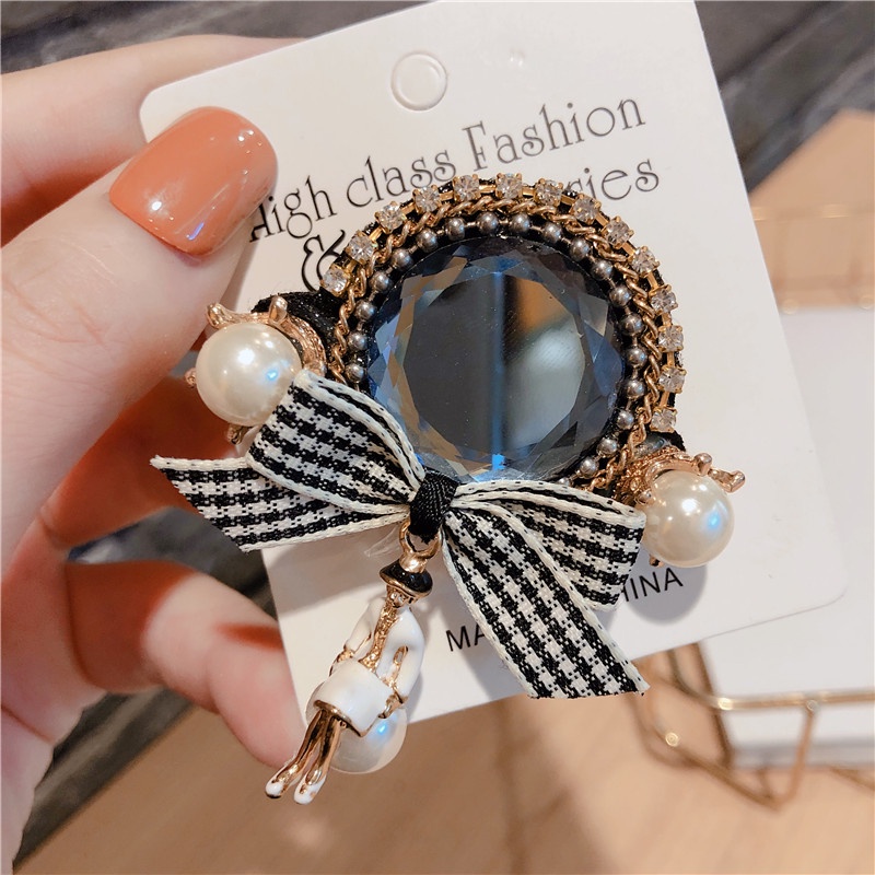 Trâm cài áo hình nơ đính ngọc trai sang trọng