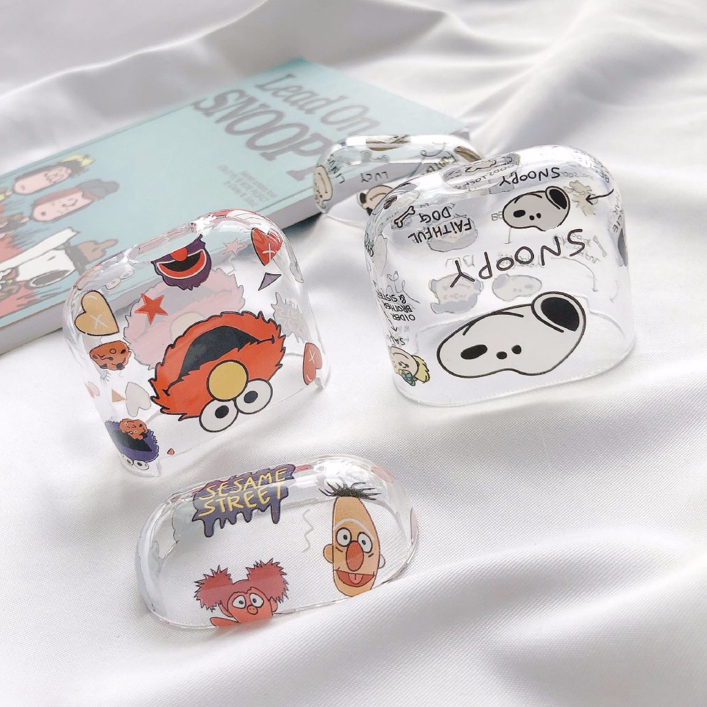 Vỏ bảo vệ hộp sạc tai nghe Apple Airpods trong suốt họa tiết Sesame Street/Snoopy hoạt hình