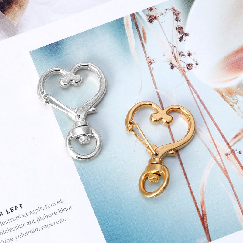 Set 10 Móc Khóa Kim Loại Hình Trái Tim Xoay