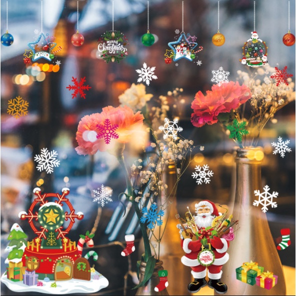 Decal dán tường Noel Hít Tĩnh Điện không Dơ Kính - Ông già noel ôm quà bên đu quay