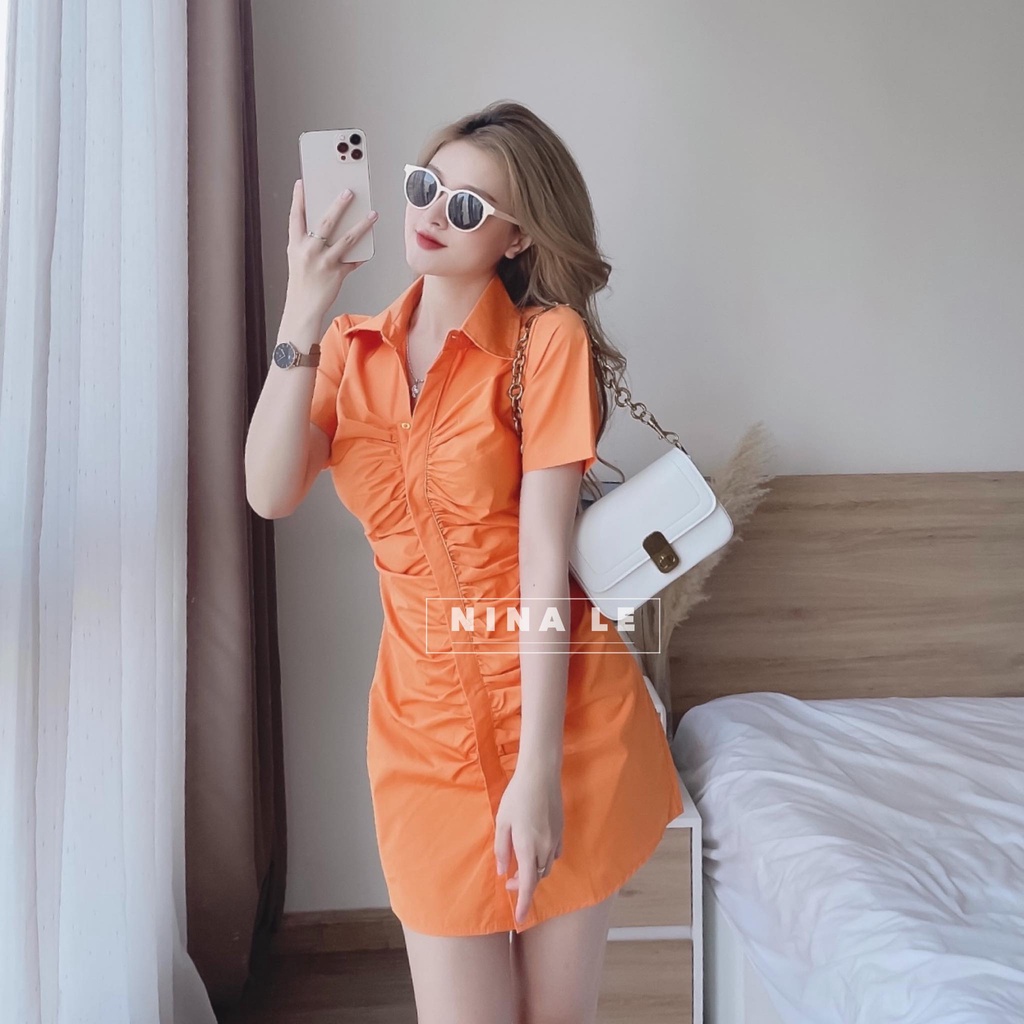 Đầm sơ mi tay ngắn phối hàng nút xếp ly màu sắc  siêu xinh giúp nàng nổi đi chơi, đi biển