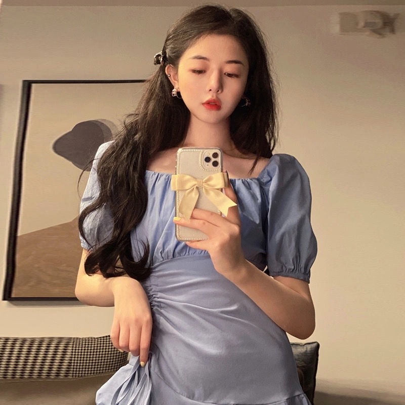 Đầmtrắng xếp ly phối dây rút thiết kế lệch tà cá tính thời trang