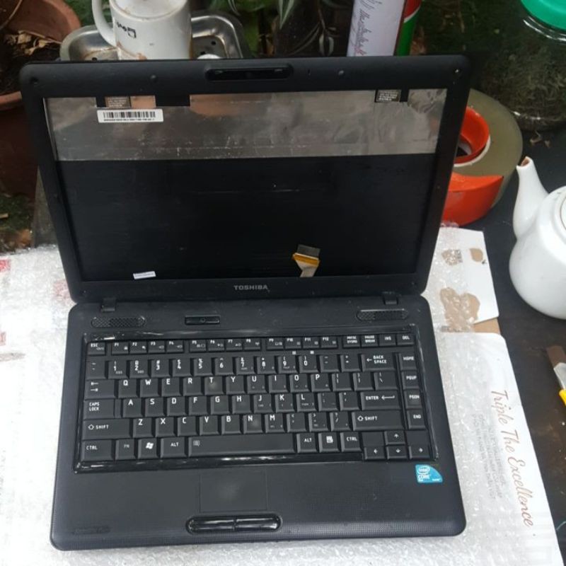 Vỏ laptop toshiba l510 đen sần