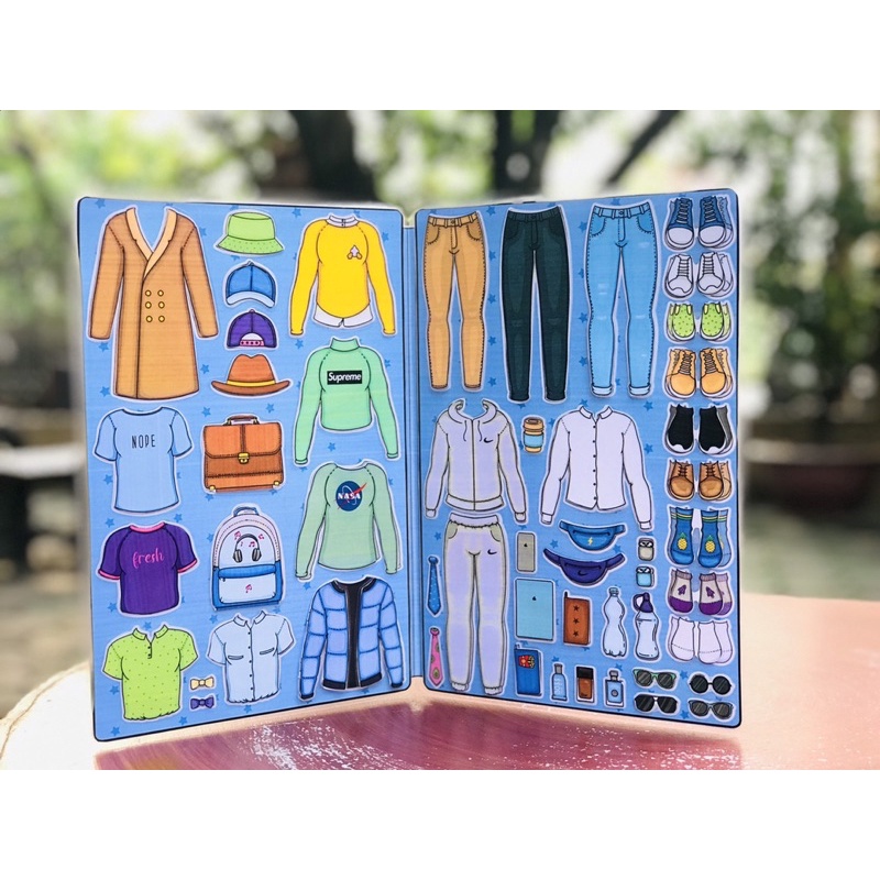 THAY ĐỒ CHO BÚP BÊ NAM PHI HÀNH GIA