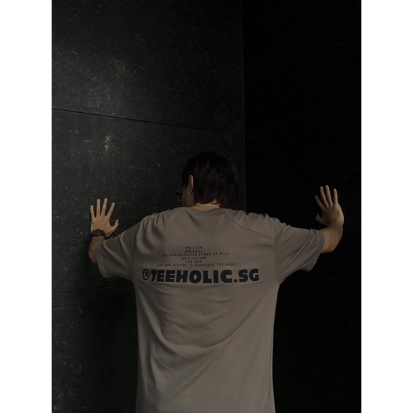 Áo Thun Unisex TeeHolic Thả Vai Xẻ Tà Màu Nâu In Logo THS Silicon Nổi