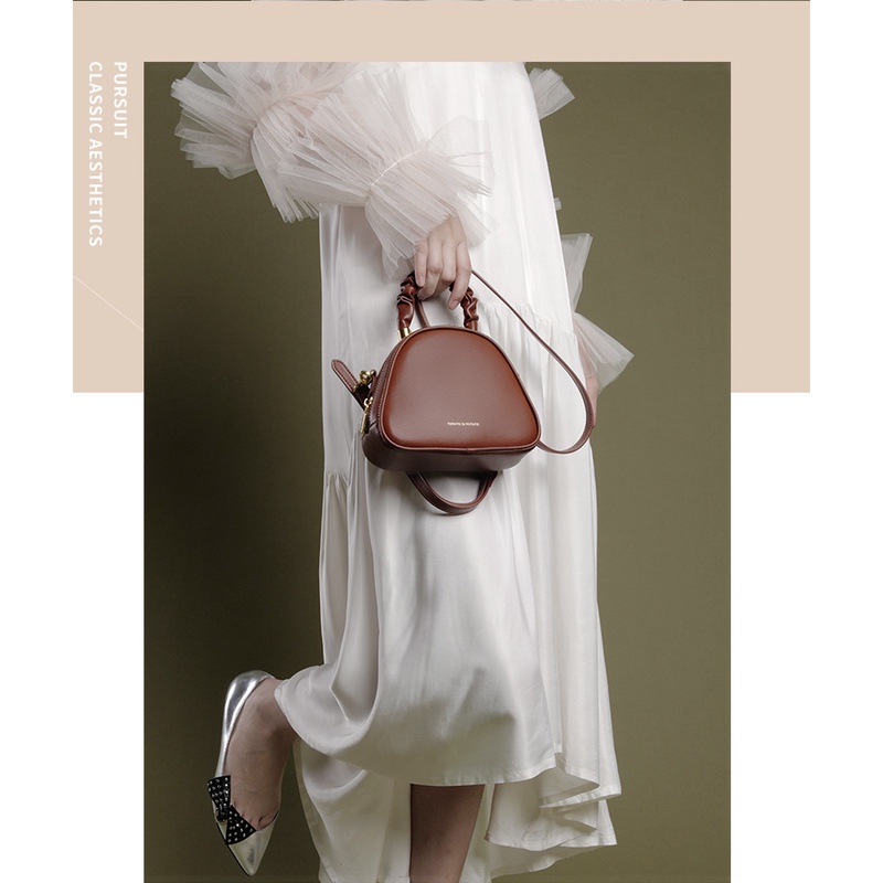 Túi xách nữ da trơn quai xoắn đeo chéo xách tay tông màu nâu hot trend 2022