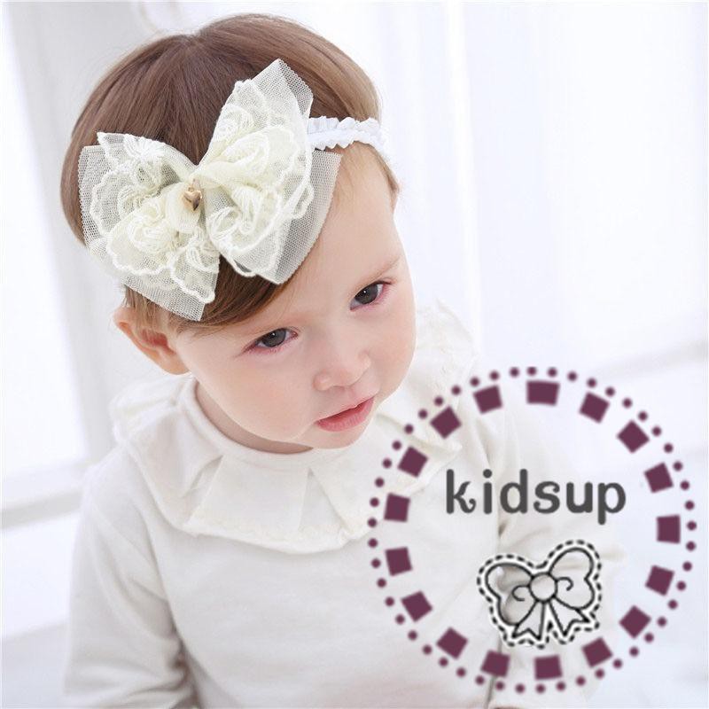 Băng đô dành cho bé gái tập đi gắn hoa