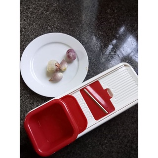 Dụng cụ thái hành,tỏi,củ đa năng