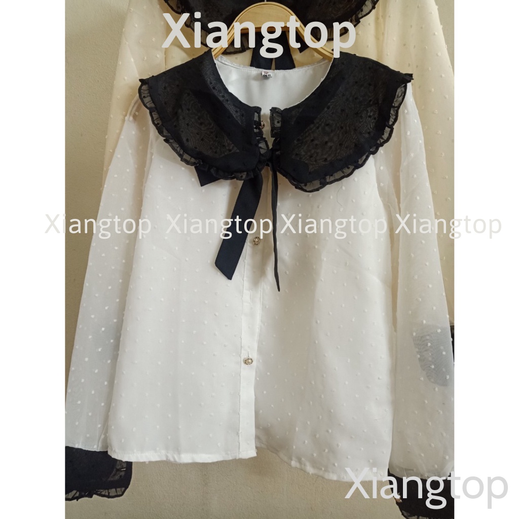 Áo sơ mi tay bồng tiểu thư