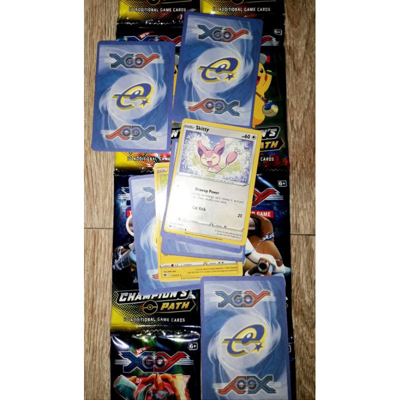 sét 12 pack có 96 thẻ bài Pokemonn_Champion Path VMax bằng giấy bóng cứng óng ánh tiếng Anh