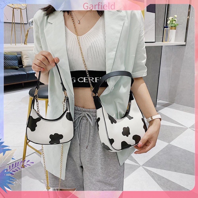 Túi xách da họa tiết da bò sữa thời trang nữ sành điệu