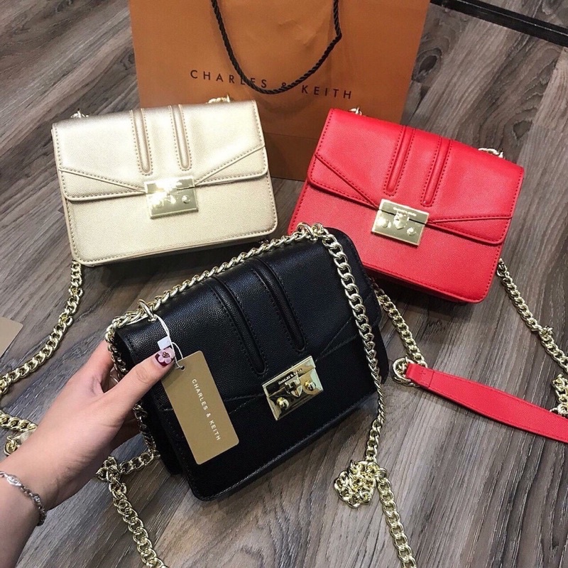 Túi đeo chéo quỳnh búp bê dây xích. hàng nội đại trung chuẩn xịn