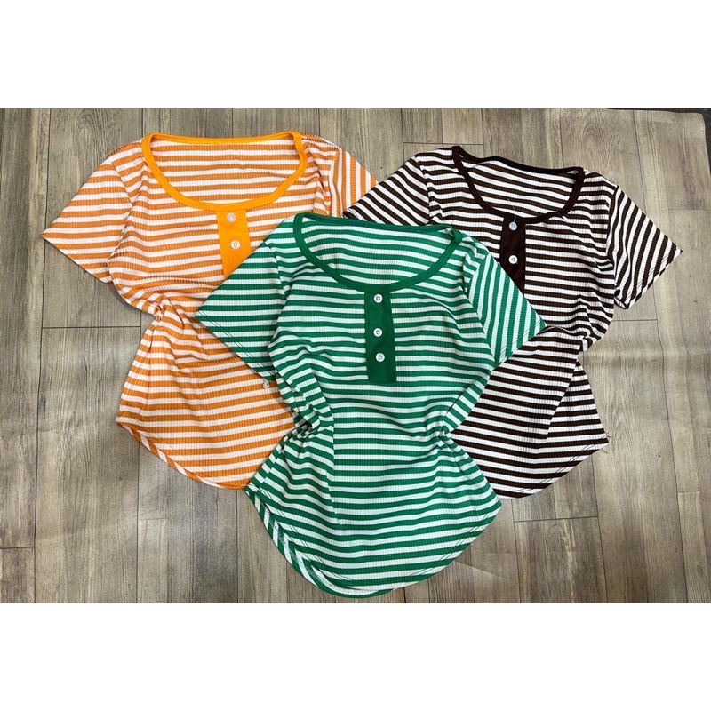 Áo kiểu phối nút