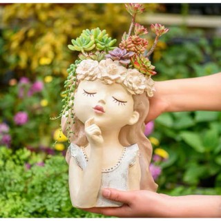 Bình hoa cô gái tóc dài