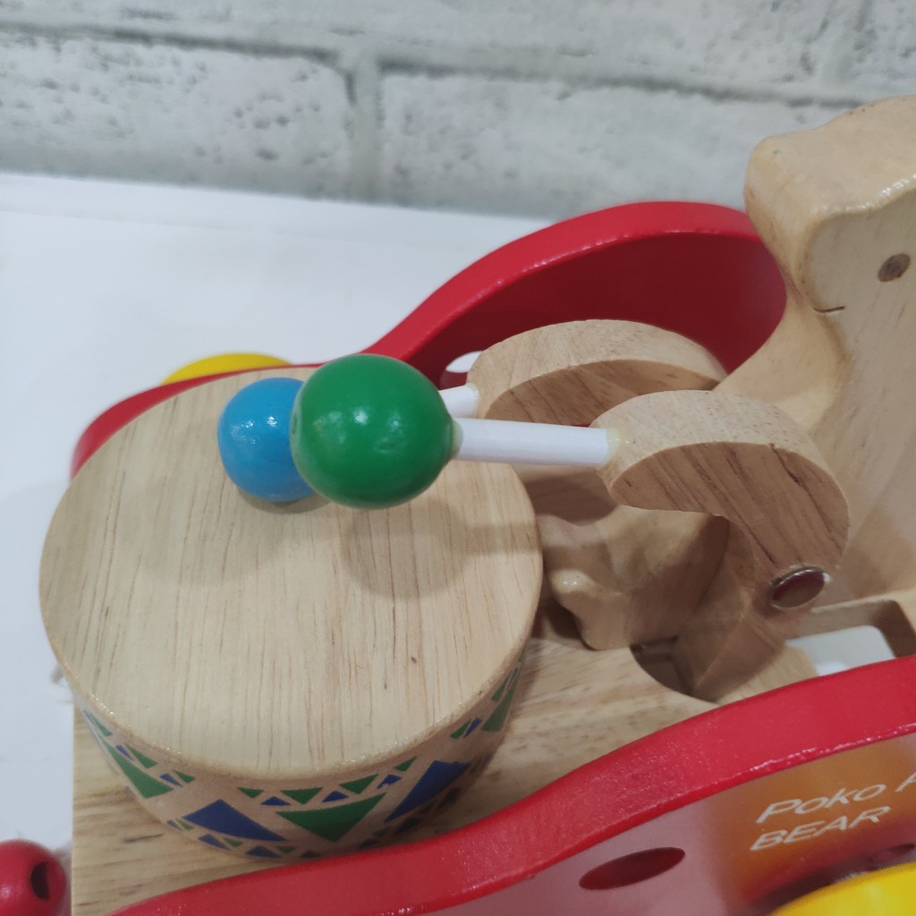 Xe kéo đánh trống đỏ. Đồ chơi thông minh, kỳ thú cho các bé nhỏ.