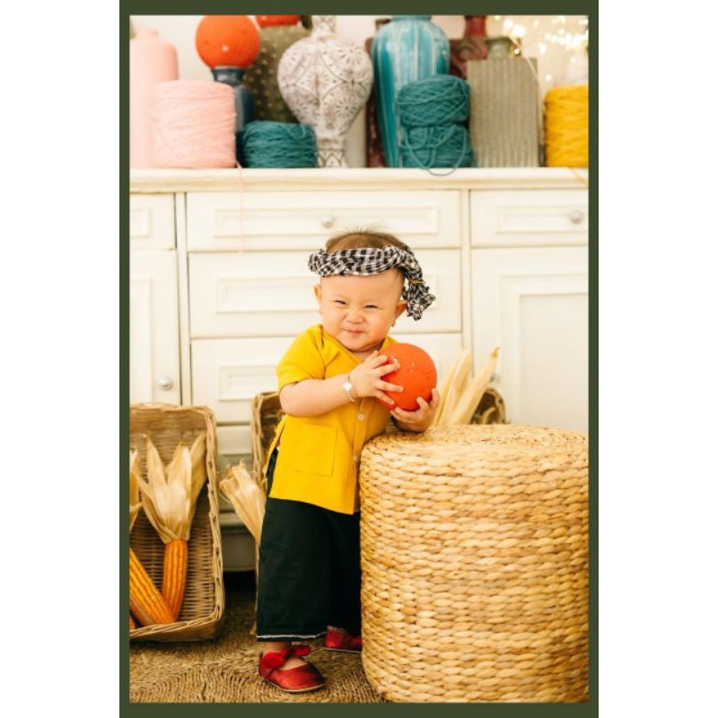 Áo bà ba màu vàng cho bé