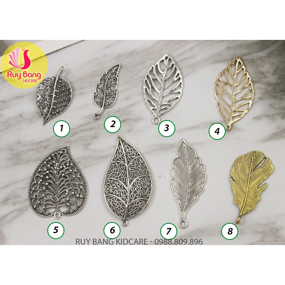 Cành lá kim loại, center đá đính hoa vải handmade