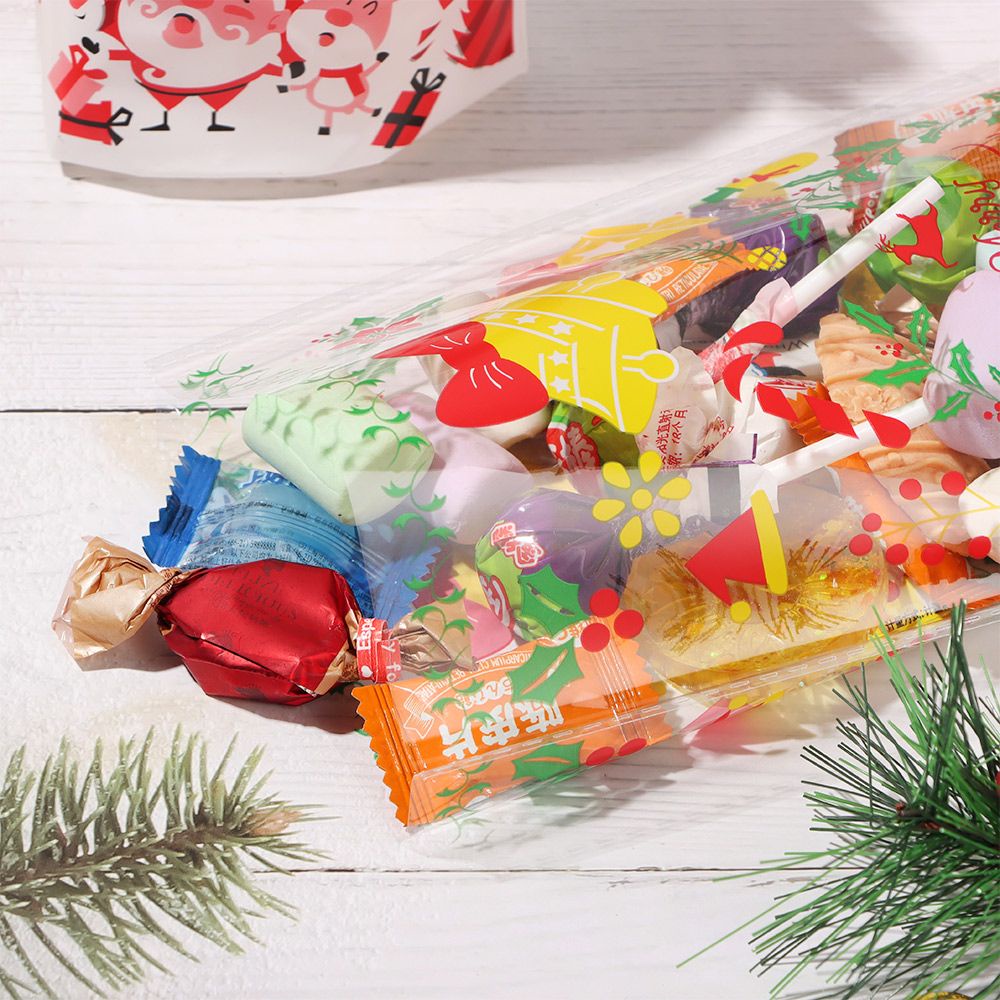 Set 50 túi đựng bánh kẹo bằng giấy bóng kính in hình giáng sinh sáng tạo