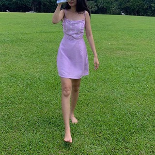 Đầm 2 dây hoa cúc nơ lưng Marvinle