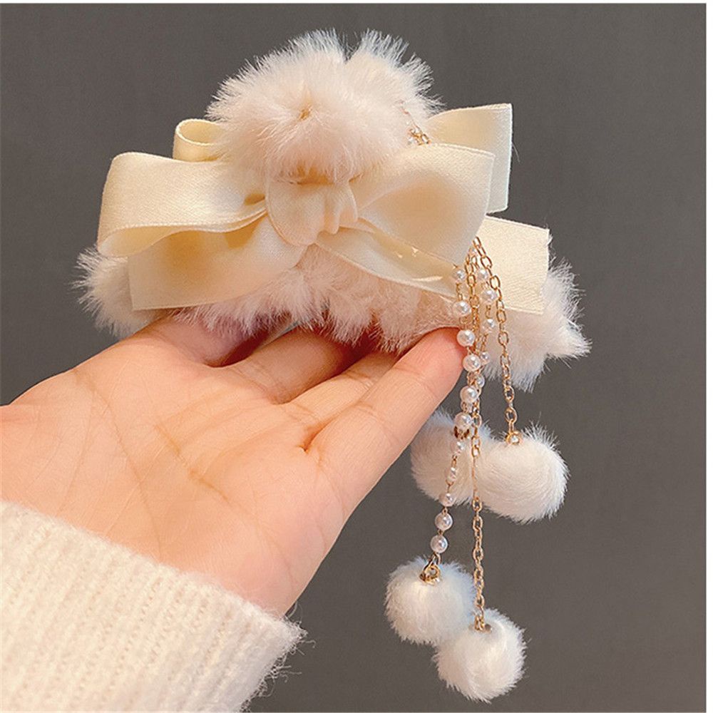 Kẹp tóc phối lông giả thắt nơ thời trang thu đông cho nữ