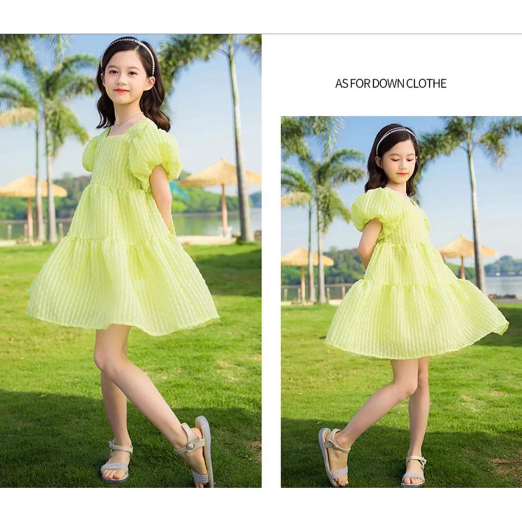 Đầm tay bồng màu xanh cốm nơ sau lưng cho bé gái