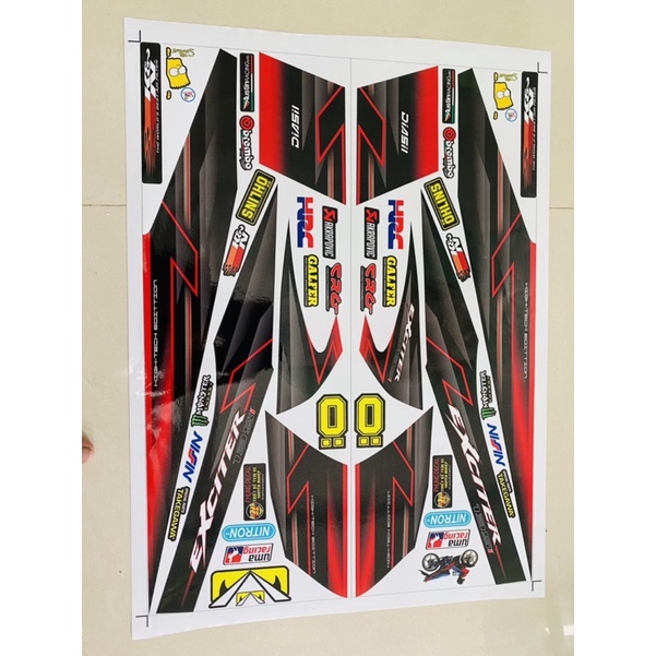 ( Quí khách vui lòng mang ra tiệm cho thợ dán ) xe Exciter 2010 đỏ đen (rời)