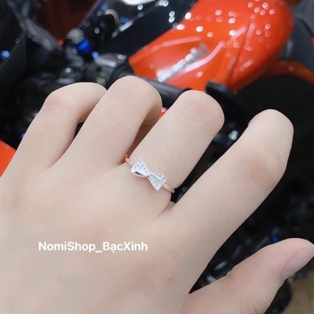 Nhẫn nơ Bạc ta cho nữ, hoạ tiết nơ đính đá liti gấp cạnh trơn bóng tạo nét mới lạ dễ thương Mainomi Shop Bạc Xinh