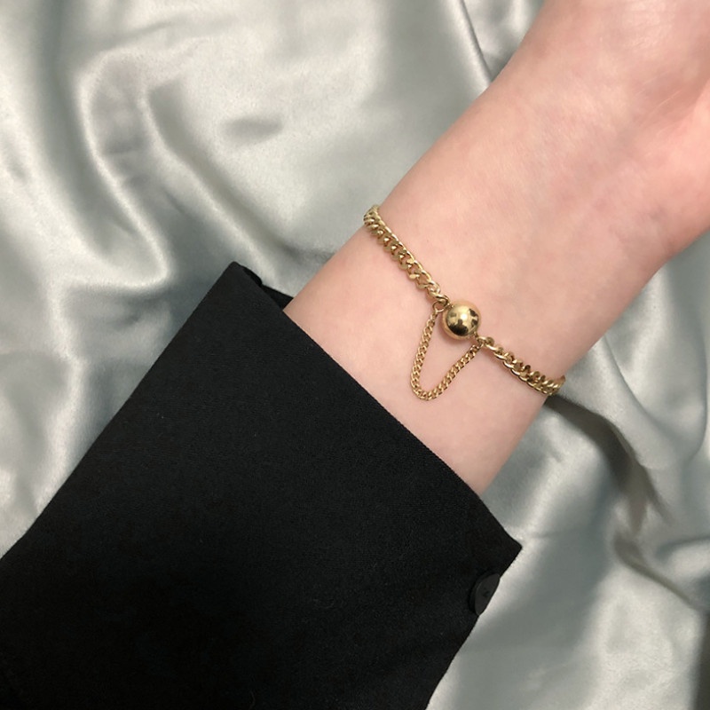 Lắc Tay Dây Xích Trái Châu Titan Ko Han Rỉ TT 3864 - màu vàng