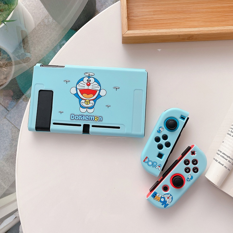 Kho mới Phim hoạt hình Winnie the Pooh Hello kitty Doraemon Nintendo Switch Vỏ silicone mềm Vỏ bảo vệ Công tắc Vỏ công tắc