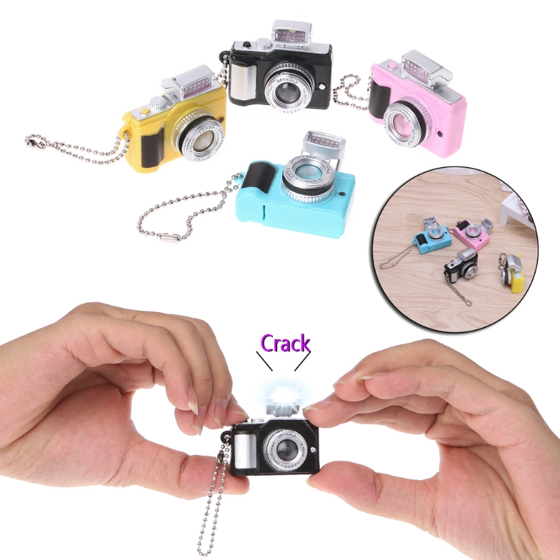 Móc chìa khóa hình máy ảnh có đèn led kèm nhạc vui nhộn
