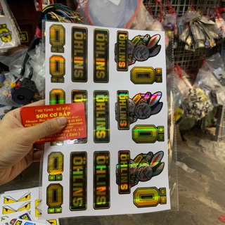 Tem crom dán xe thỏ điên vàng ohlin