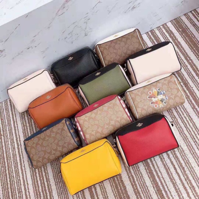 TÚI COACH TRỐNG MINI F76628