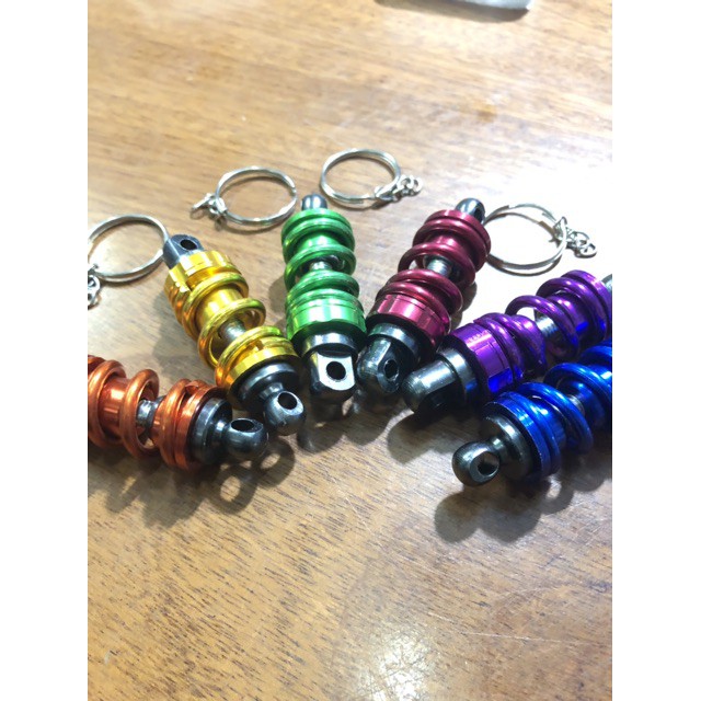 Móc khoá xe hình phuộc CNC