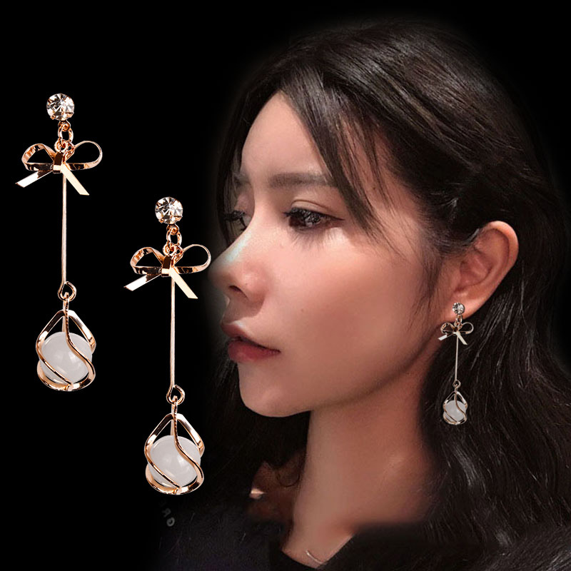 Đôi bông tai mạ bạc 925 hình nơ tua rua dài