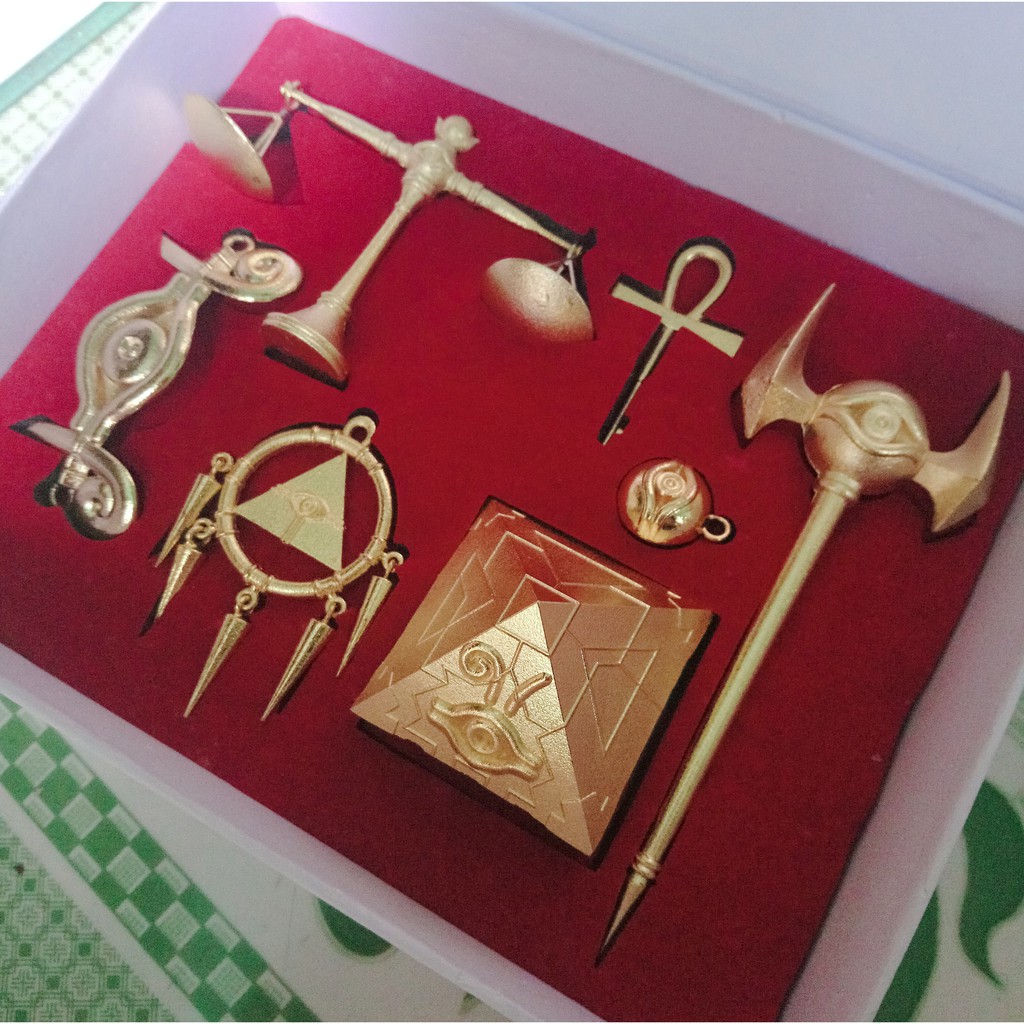 Bộ 7 báu vật ngàn năm Yugioh bằng kim loại ( trang trí, dây chuyền, móc khoá )
