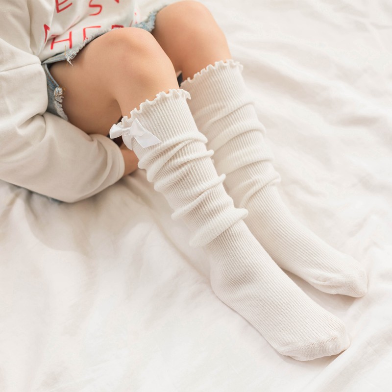 Tất dài chất liệu cotton đính nơ thời trang dành cho bé gái