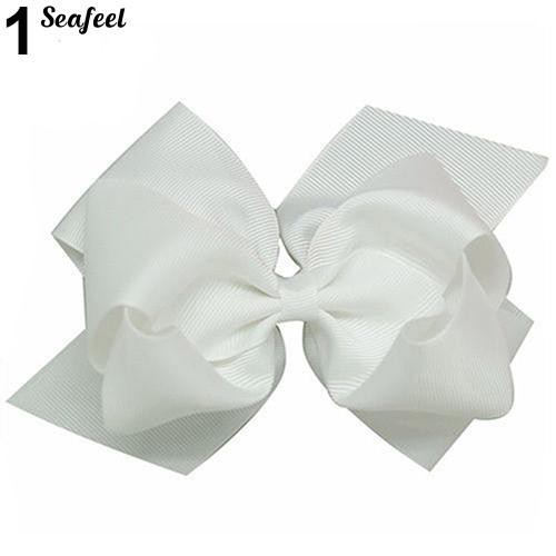 Kẹp tóc kiểu nơ bằng vải với nhiều màu sắc đầy dễ thương