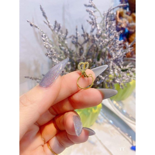 KẸP NƠ VÀNG LÀM MẶT TÚI TIỀN