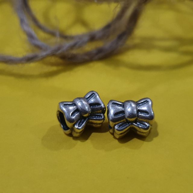 Charm bạc 925 nơ xỏ ngang