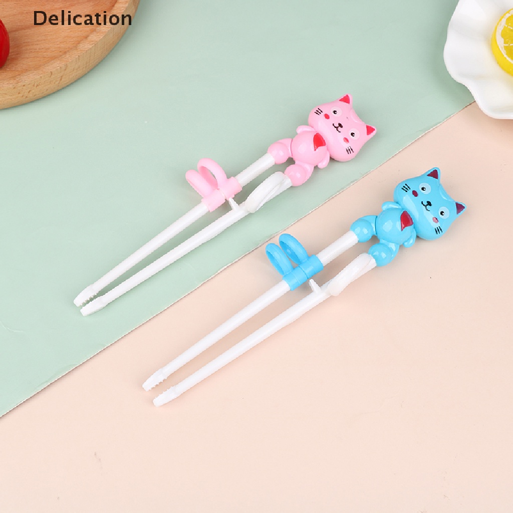 1 Đôi Đũa Nhựa Hình Hoạt Hình Cho Bé Tập Ăn