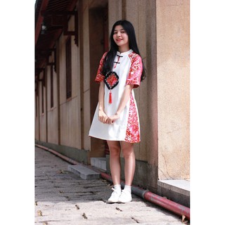 Đầm gấm tay phối
