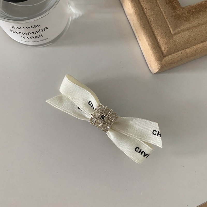 Kẹp tóc nơ đá vuông xinh xắn