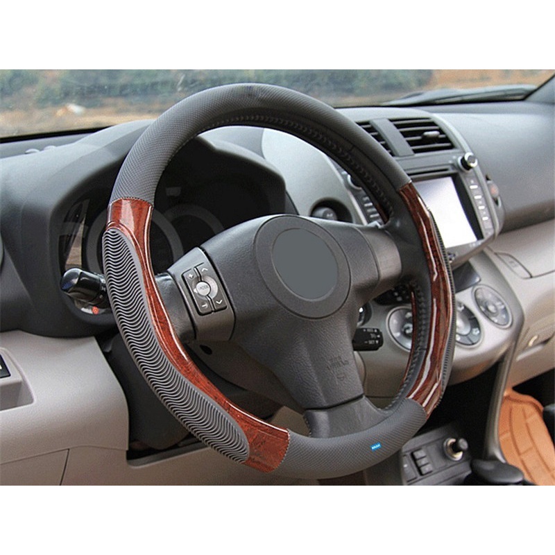 Bọc volang oto, bao tay lái xe hơi da vân gỗ pha gân massage