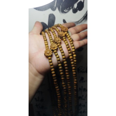 Vòng gỗ bách xanh mix sen