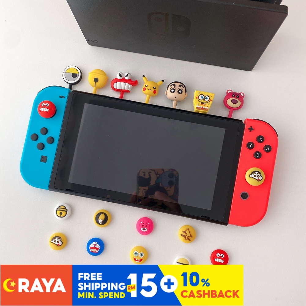 Set 4 Nút Bịt Chống Bụi Cho Nút Bấm Máy Chơi Game Nintendo Switch Hình Doraemon / Pikachu / Cậu Bé Bút Chì / Dâu Tây / Cậu Bé Bút Chì