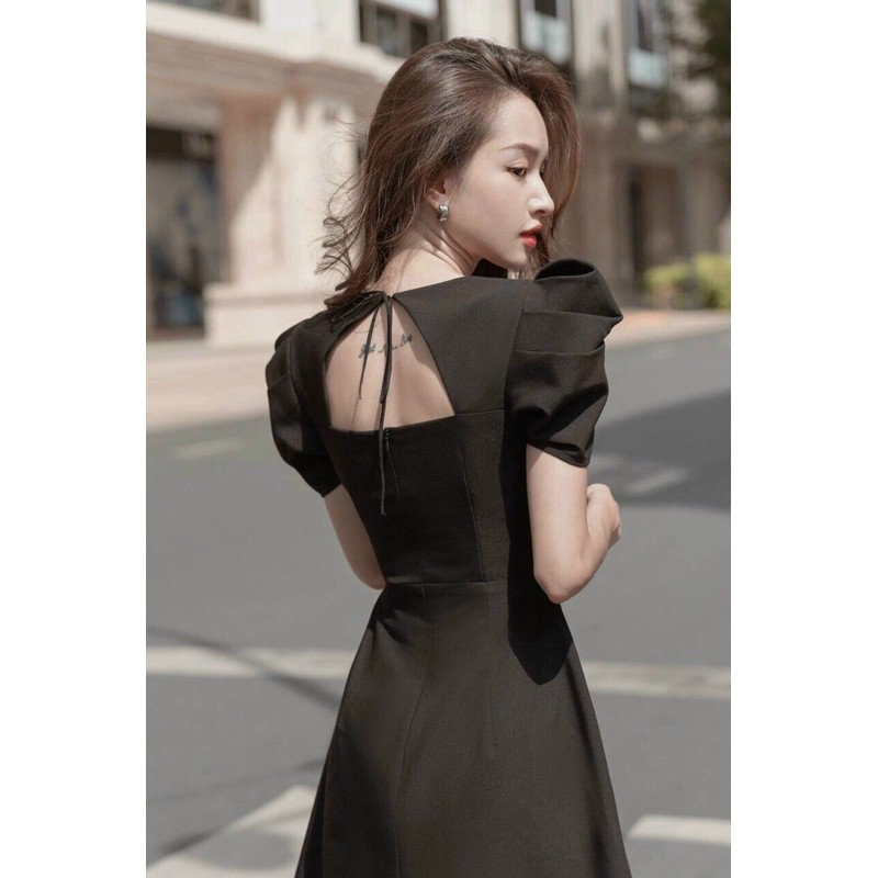 Váy chữ A tay phồng xếp ly hở lưng