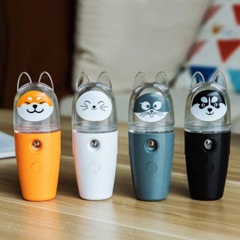 MÁY PHUN SƯƠNG XÔNG HƠI MẶT MINI CẦM TAY HÌNH BÒ SỮA CUTE/