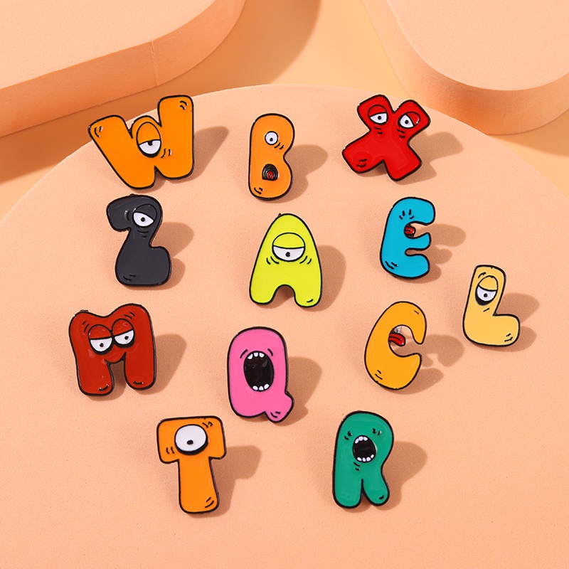 Huy Hiệu Cài Áo Hình 26 Chữ Cái Tiếng Anh Họa Tiết Hoạt Hình Ngộ Nghĩnh