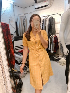 Váy kẻ xoắn eo buộc nơ